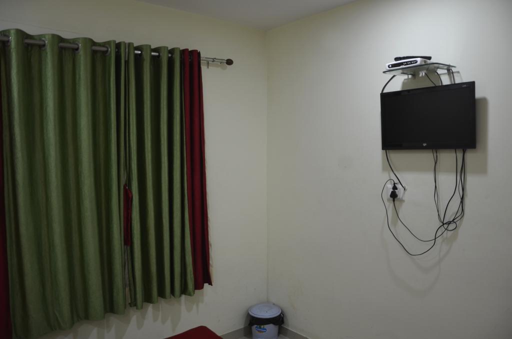 Hotel Royal Apple Ahmedabad Værelse billede