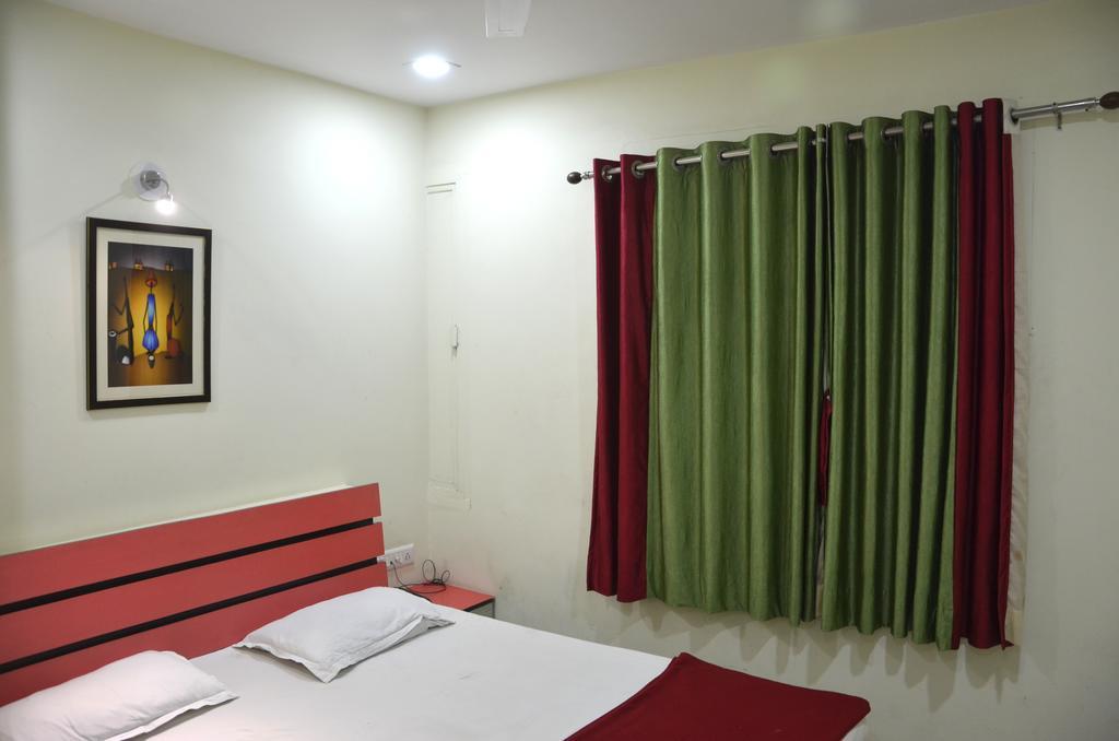 Hotel Royal Apple Ahmedabad Værelse billede